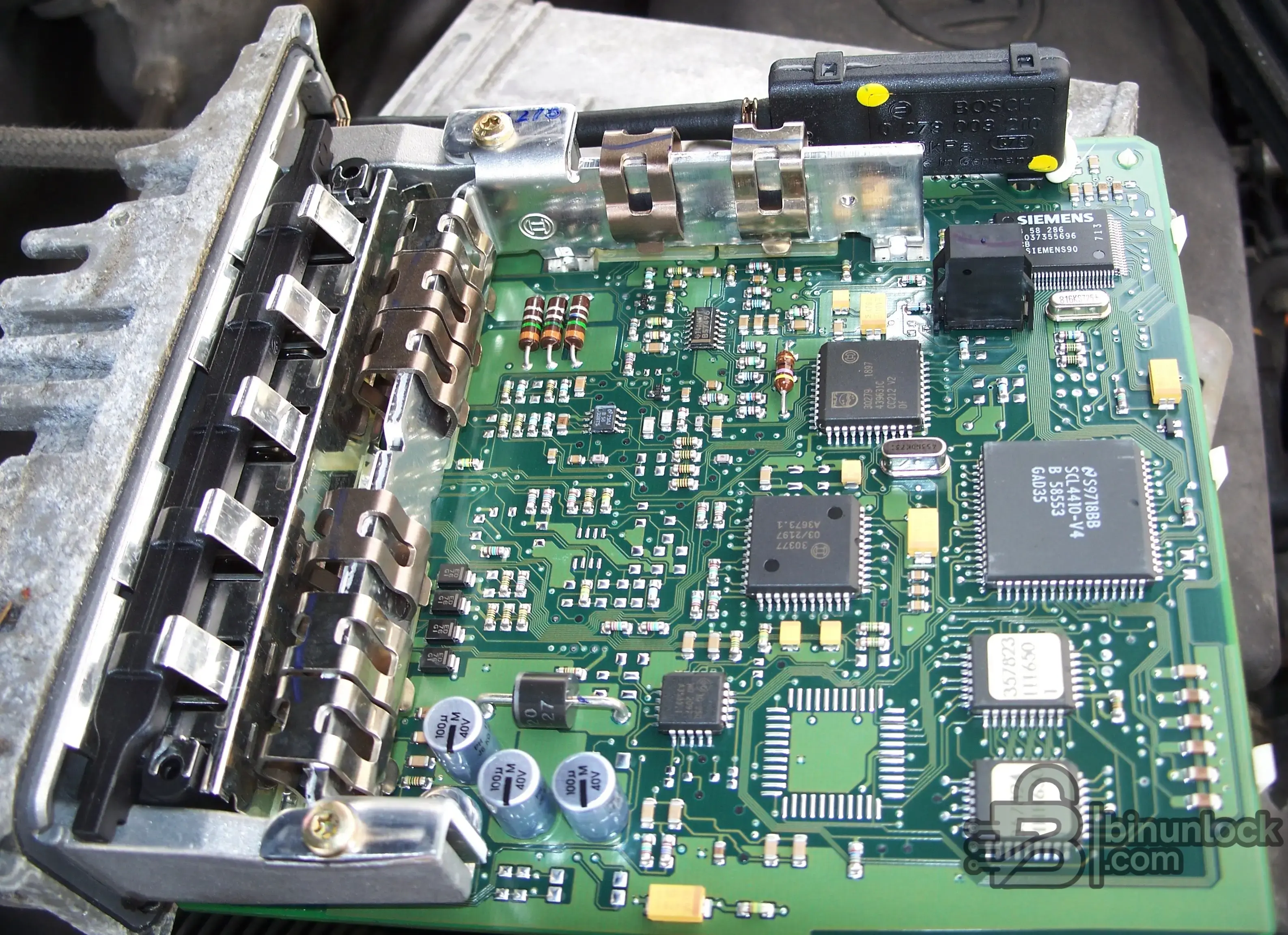 Opened ECU circuit board showing board-level access for Boot, BDM, JTAG and EEPROM work.